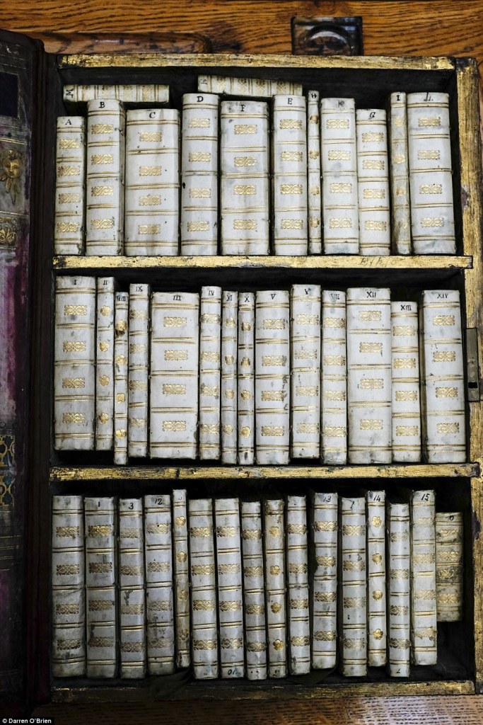 1412528708870_wps_3_A_rare_miniature_travelli