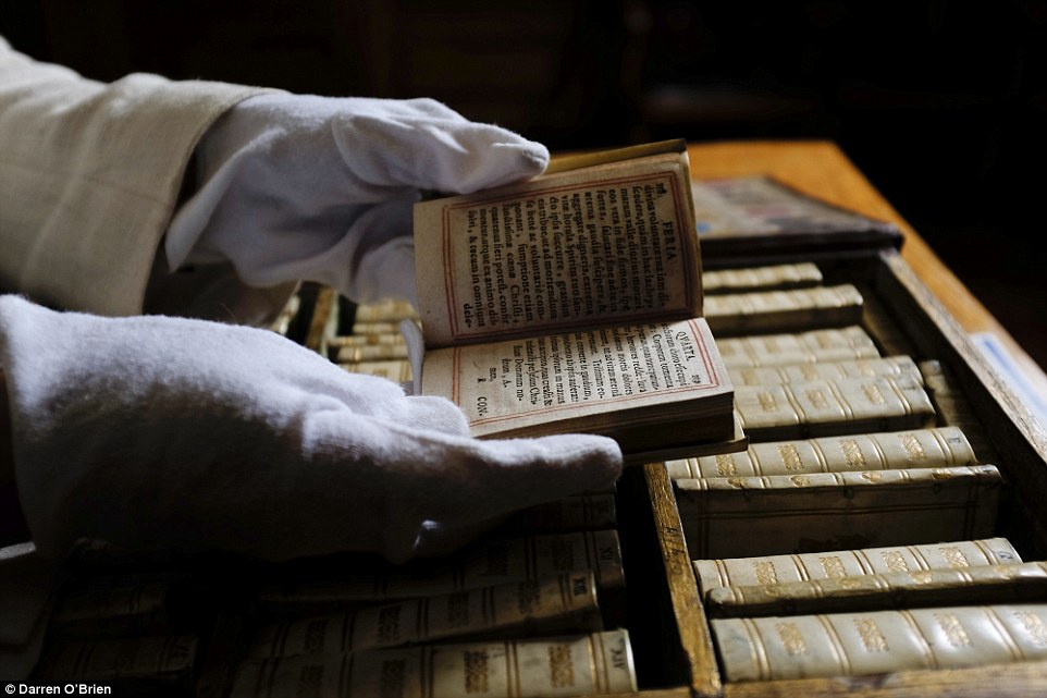 1412528870177_wps_27_A_rare_miniature_travelli